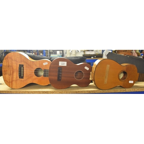 1157 - 3 Ukuleles With Carry Cases