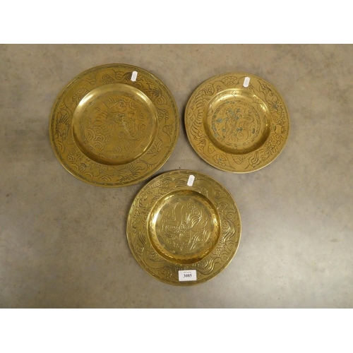 3085 - Three Oriental Brass Wall Plates.