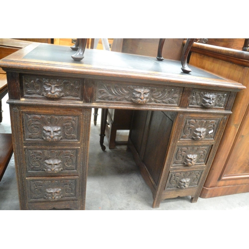 4193 - Victorian Carved Oak Green Man Twin Pedestal Writing Desk