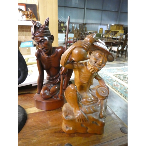 580 - Two Eastern Carved Figures