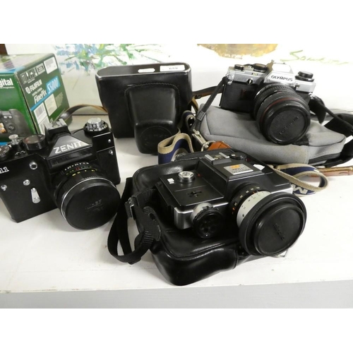 659 - Three Vintage Cameras, Zenit, Olympus and a Minolta