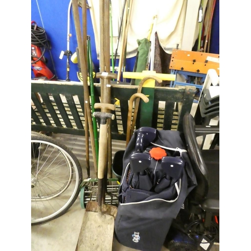 69 - Travel Cot, Mop Bucket, Walking Sticks, Seed Sprayer and Assorted Garden Tools