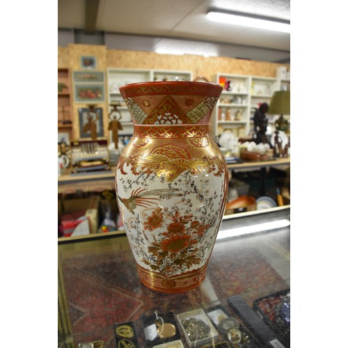 1633 - Pair of Japanese Kutani Vases, painted with figures in landscape, approx 31cm tall.