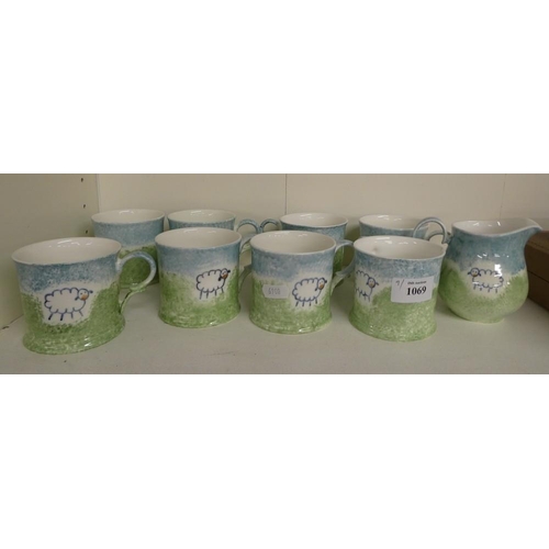 1069 - Forest Originals Mugs & Matching Milk Jug, painted with sheep in landscape.