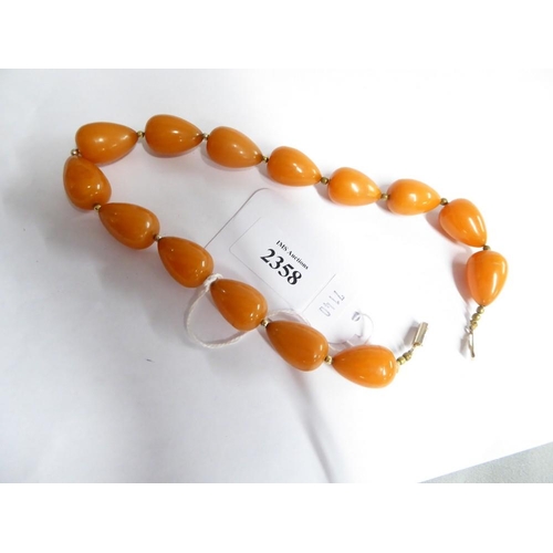 2358 - Vintage Egg Yolk Coloured Bakelite Choker Necklace with gold plated mounts, approx 41cm long.