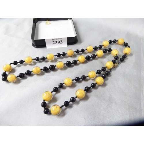 2393 - Vintage Glass Necklace (black, Yellow & Goldstone), approx 76cm long.