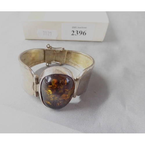 2396 - 925 Silver Bangle Inset with Large Central Amber Cabuchon.