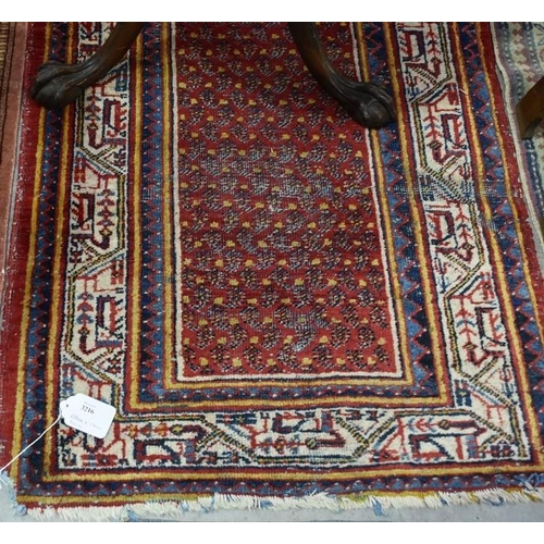 3216 - Antique Wool Fringed & Bordered Geometric Rug on Red Ground 130cm x 80cm