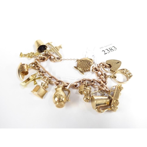 2383 - 9ct Gold Charm Bracelet - 51.9g