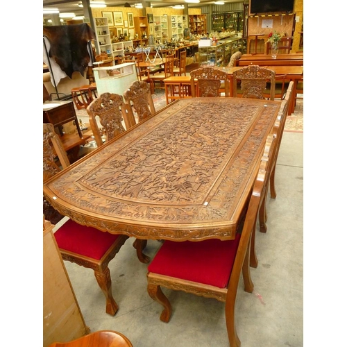 3087 - Anglo Indian Heavily Carved Dining Table & 8 Matching Chairs