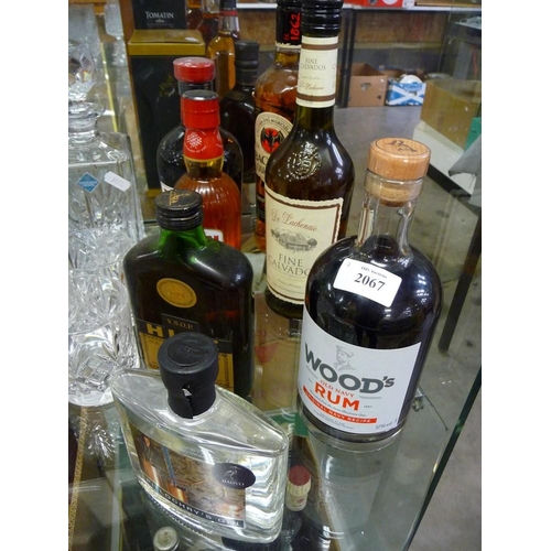 2067 - 7 Bottles & Half Bottles of Assorted Spirits, Calvados etc