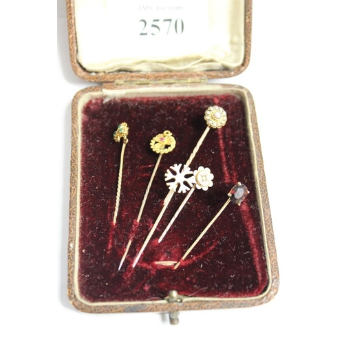 2570 - Case of Six Assorted Gold Tie Pins, approx 5.5g