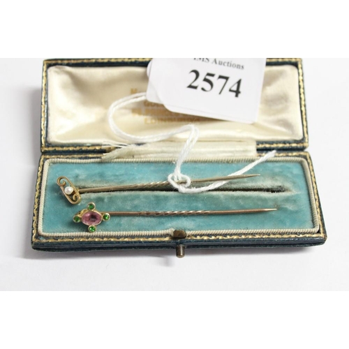 2574 - Two Gold Tie Pins inset with Seed Pearl & Various Jewels, 2.2g. (Jewelled Tie Pin 15ct Terminal)