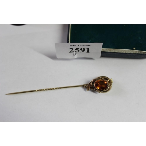 2591 - Large Size Single Gold Tie Pin, with scrolling foliate top inset with facet cut Amber coloured stone... 