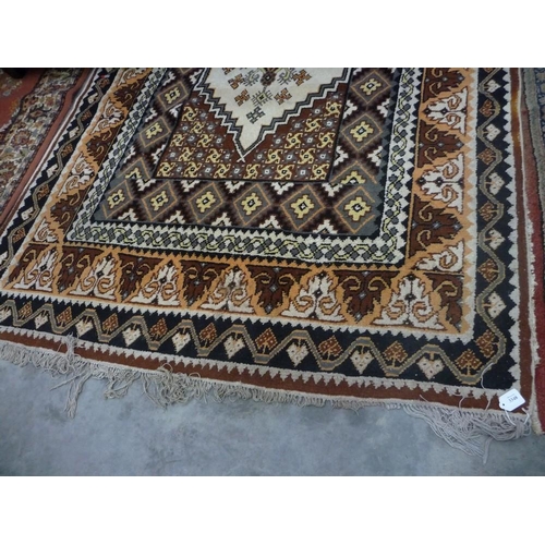 3348 - Fringed and Bordered Geometric Rug on Brown Ground