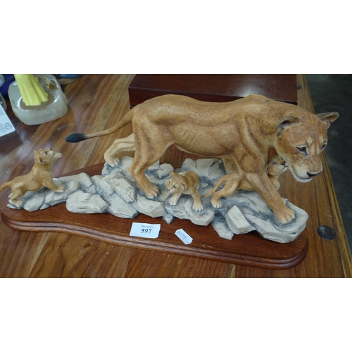 597 - Large Border Fine Arts Ornament - Lioness with Clubs