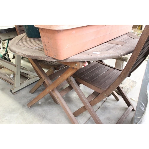 66 - Folding Hardwood Garden Table and Two Folding Hardwood Chairs