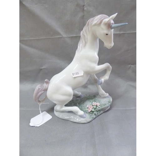 1031 - Lladro Porcelain Unicorn 7697, approx 22cm tall.