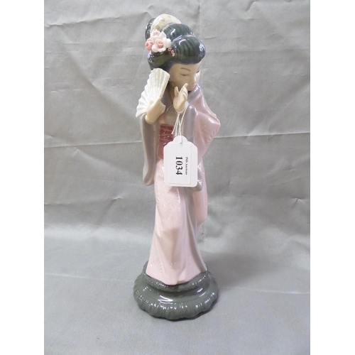 1034 - Lladro Porcelain Figurine - Japanese Female Figure holding Fan, approx 30cm tall.