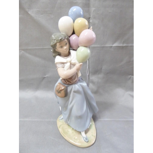 1036 - Lladro Porcelain Figurine - Girl Holding Balloons, approx 26cm tall.