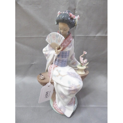 1037 - Lladro Porcelain Figurine - Japanese Lady Seated Holding Fan, approx 23cm tall.