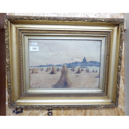 1093 - Framed Watercolour - Evening View, Field of Haystacks with Town in distance, signed DB Mackay, appro... 