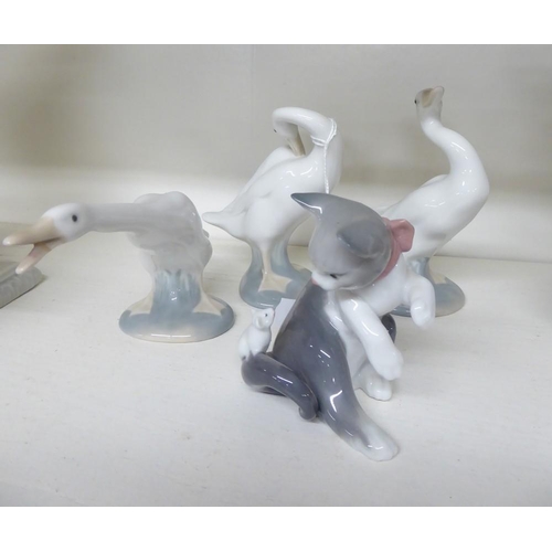 1099 - 3 Lladro Porcelain Geese & a Cat.
