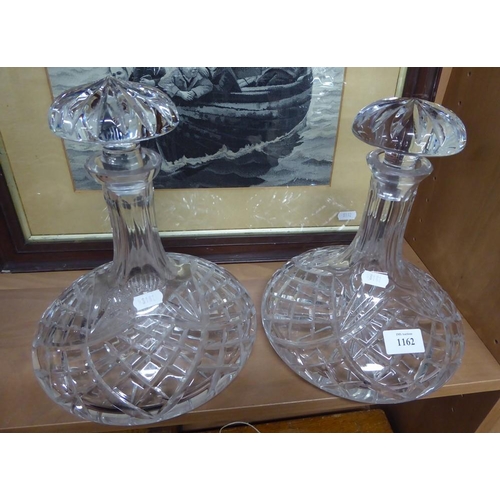 1162 - Large Pair of Heavy Facet Cut Ships Decanters - approx 23cm base diameter.