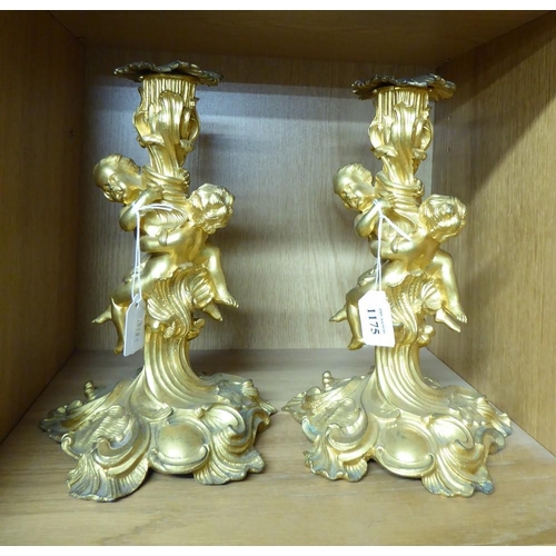 1175 - Pair of Antiqe French Gilt Metal Figural Candlesticks, approx 25cm tall.