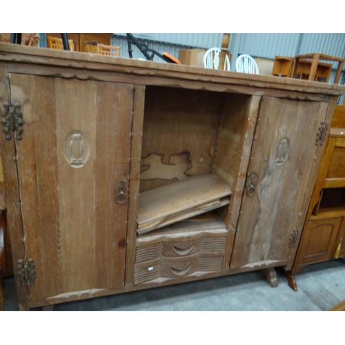 3152 - Carved Oak Closed Front Bookcase