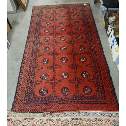 2448 - Eastern Wool Rug, Red/pink Ground, approx 188 x 109cm.