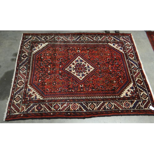 2455 - Fringed & Bordered Geometric Wool Rug, approx 147 x 114cm.