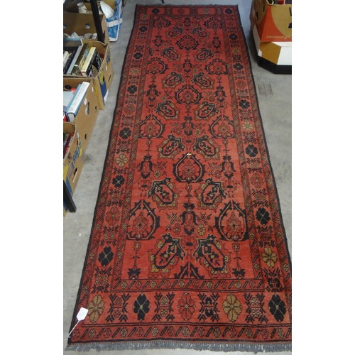 2460 - Eastern Red Ground Wool Runner, approx 286 x 89cm.