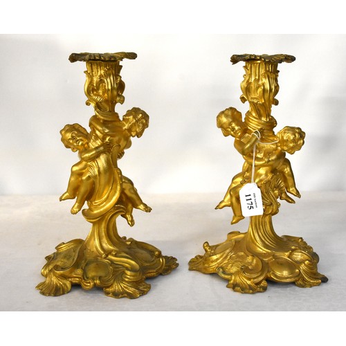 1175 - Pair of Antiqe French Gilt Metal Figural Candlesticks, approx 25cm tall.