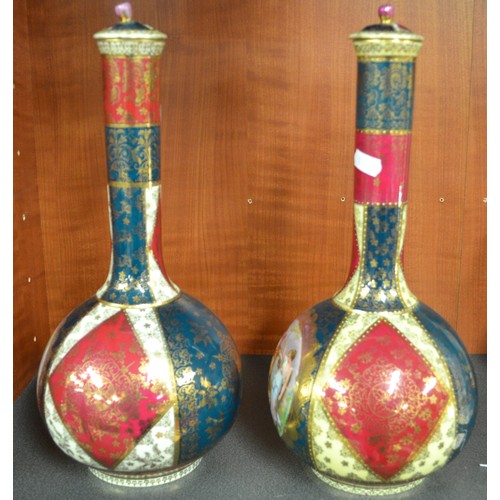 1495 - Pair of Early 20th Century Bottle Shaped Vases, Panels of Figures signed Kaufman, approx 35cm tall.