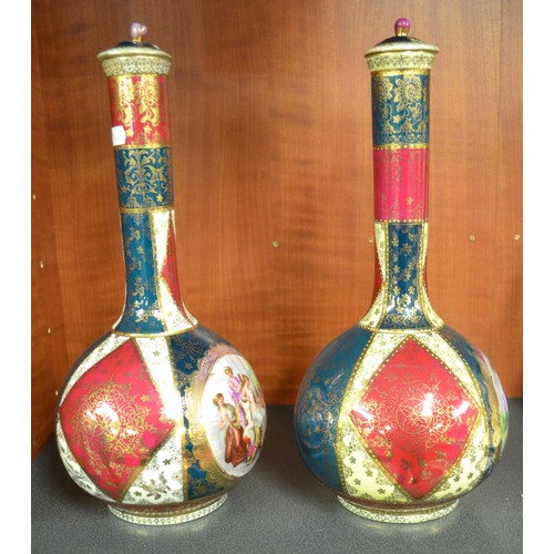 1495 - Pair of Early 20th Century Bottle Shaped Vases, Panels of Figures signed Kaufman, approx 35cm tall.