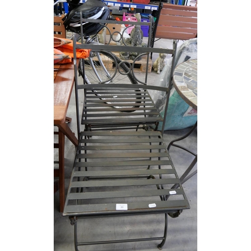 55 - Pair of Heavy Duty Folding Wrought Iron Garden Chairs.