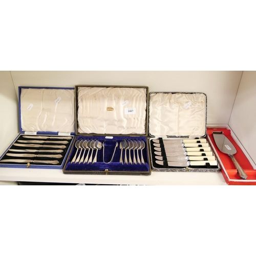 1007 - Two Cased Sets of Tea Knives, Cake Slice & Teaspoons.