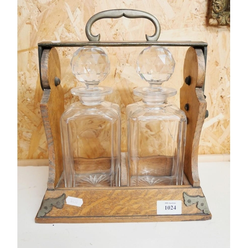 1024 - Edwardian Two Decanter Tantalus, Oak with Brass Mounts.