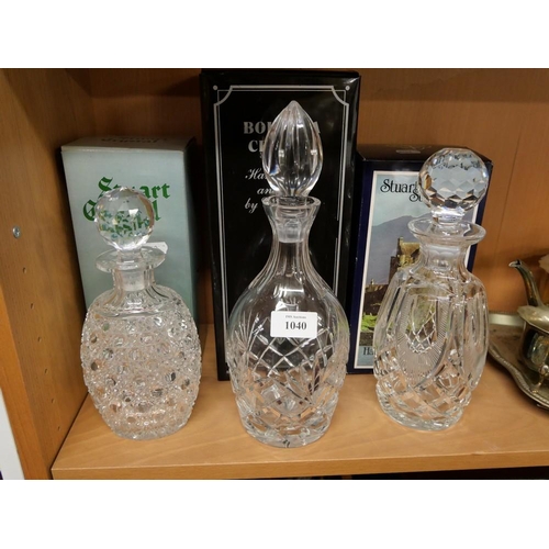 1040 - Three Boxed Crystal Decanters.