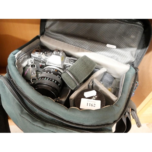 1162 - Olympus 35mm Camera & Accessories in Bag.