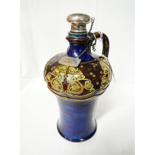 1195 - Doulton Lambeth Art Nouveau Bottle Shaped Decanter designed by Georgina Pearson, approx 23cm tall.