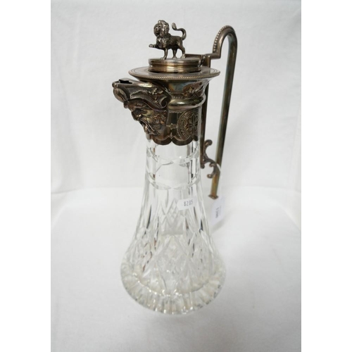 1200 - A Fine Edwardian Cut Glass Claret Jug with Silverplated Mounts.