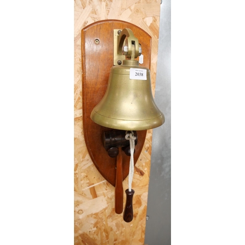 2038 - Heavy Brass Wall Mounted Bell, complete with wooden Mallet, approx 57cm tall (backplate height).