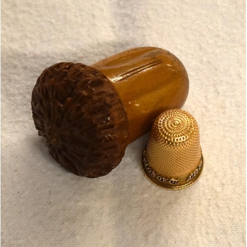 2468 - Gold Plated Thimble in Carved Acorn Shaped Wooden Case.