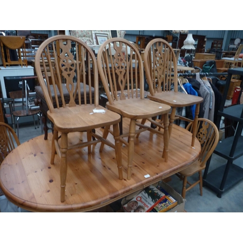 3370 - Extending Dining Table with 8 Light Ash Windsor Wheel Back Chairs