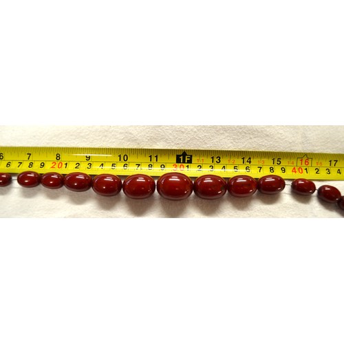 2464 - Cherry Amber Graduated Bead Necklace 102g approx 76cm long, largest Bead 28cm