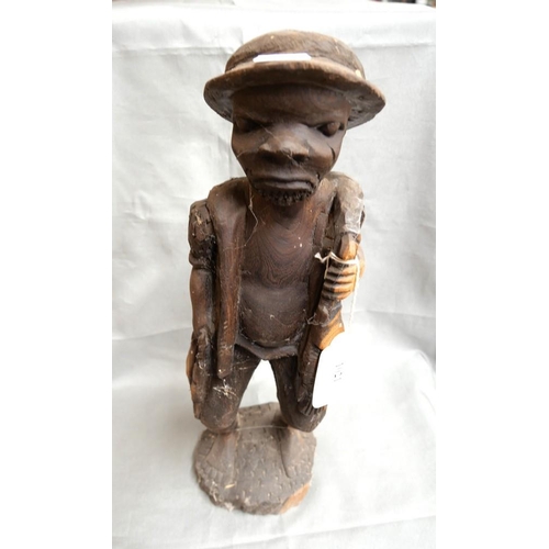 1021 - Antique African Carved Figure - Fisherman, approx 39cm tall.