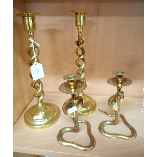 1027 - Pair of Brass Cobra Candlesticks & Pair of Brass Helixical Candlesticks.