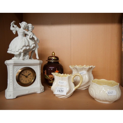 1121 - Three Pieces of Belleek Porcelain, Carlton Ware Rouge Royale Jar & Cover, Porcelain Mantel Clock.